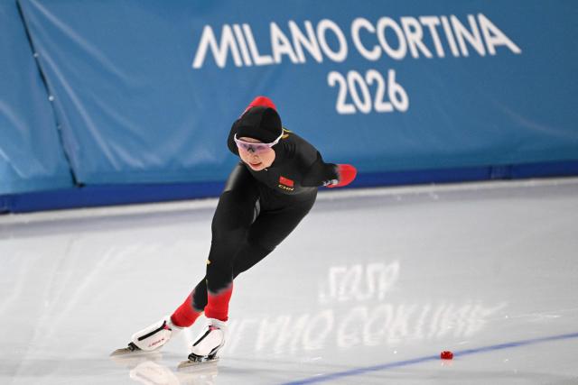 China's Tai Zhien competes in the speed skating women's 5000m during the Milano Cortina 2026 Winter Olympic Games at Milano Speed Skating Stadium in Milan on February 12, 2026. (Photo by Daniel MUNOZ / AFP)