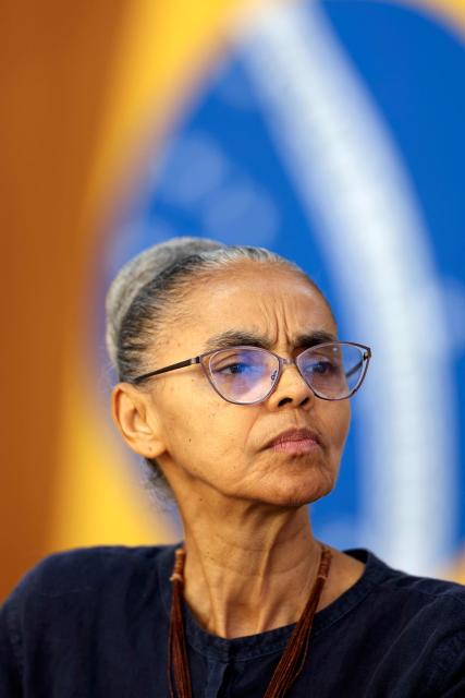 Brazils Environment Minister Marina Silva looks on during the announcement of data relating to areas under deforestation alert in the Amazon and Cerrado biomes from August 2025 to January 2026, at the Planalto Palace in Brasilia, on February 12, 2026. (Photo by Sergio Lima / AFP)