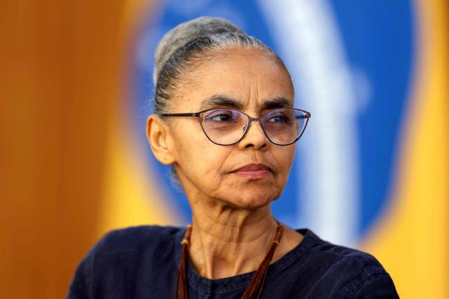 Brazils Environment Minister Marina Silva looks on during the announcement of data relating to areas under deforestation alert in the Amazon and Cerrado biomes from August 2025 to January 2026, at the Planalto Palace in Brasilia, on February 12, 2026. (Photo by Sergio Lima / AFP)