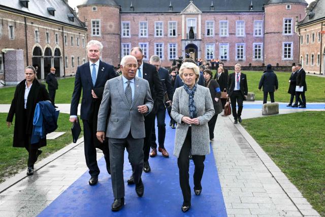 European Council President Antonio Costa (C), Lithuania's President Gitanas Nausedaand (L) and European Commission President Ursula von der Leyen (R) arrive for a working session during the Informal EU Leaders' Retreat at the Alden Biesen Castle, in Rijkhoven on February 12, 2026. (Photo by NICOLAS TUCAT / AFP)