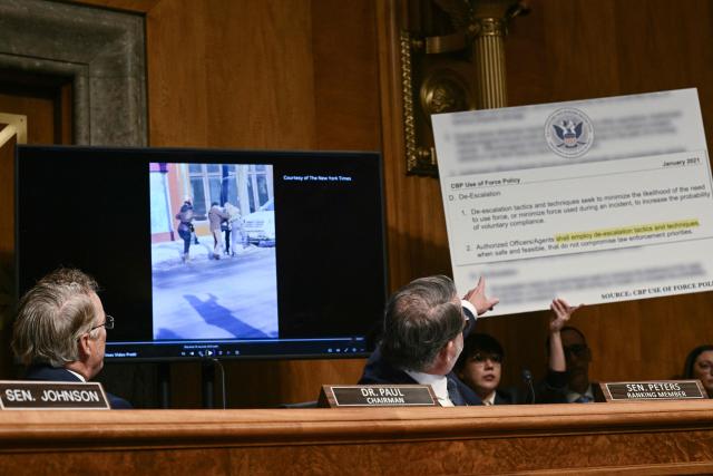 Committee ranking member Senator Gary Peters, Democrat from Michigan points to a display during a Senate Homeland Security and Governmental Affairs Committee in an oversight hearing amid scrutiny over immigration enforcement and recent developments in Minnesota at the Dirksen Senate Office Building in Washington, DC on February 12, 2026. (Photo by Brendan SMIALOWSKI / AFP)