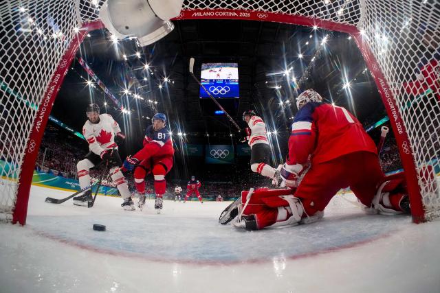 Canada's #61 Mark Stone scores his team second goal during the men's preliminary round Group A Ice Hockey match between Czech Republic and Canada at the Milano Santagiulia Ice Hockey Arena during the Milano Cortina 2026 Winter Olympic Games in Milan, on February 12, 2026. (Photo by POOL / AFP)