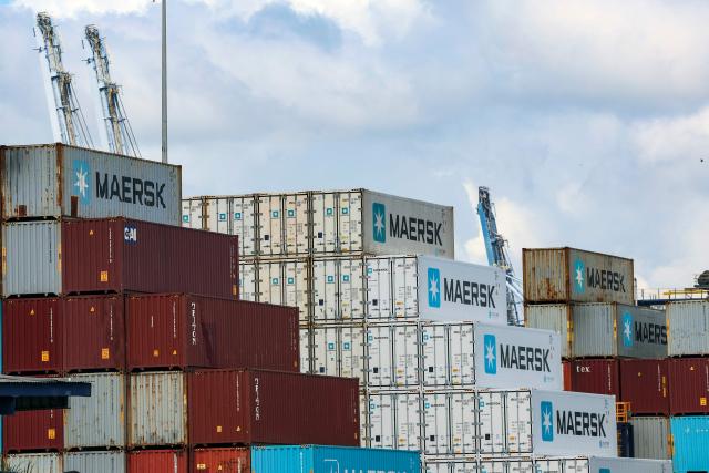 Shipping containers of the Danish company Maersk are stored at the port of Balboa in Panama City, taken on February 12, 2026. Hong Kong-based conglomerate CK Hutchison warned on February 12 of possible legal action against Danish firm Maersk and others over the annulment of its contract to operate two ports on the Panama Canal. (Photo by MARTIN BERNETTI / AFP)