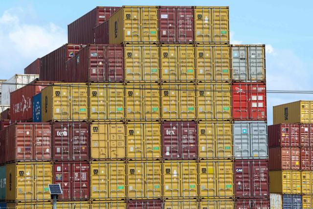 View of shipping containers stored at the port of Balboa in Panama City, taken on February 12, 2026. Hong Kong-based conglomerate CK Hutchison warned on February 12 of possible legal action against Danish firm Maersk and others over the annulment of its contract to operate two ports on the Panama Canal. (Photo by MARTIN BERNETTI / AFP)