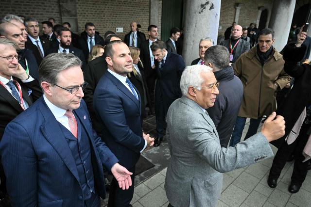 Belgium's Prime Minister Bart De Wever (L), Malta's Prime Minister Robert Abela (C) and European Council President Antonio Costa (C) react during the Informal EU Leaders' Retreat at the Alden Biesen Castle, in Rijkhoven on February 12, 2026. (Photo by NICOLAS TUCAT / AFP)