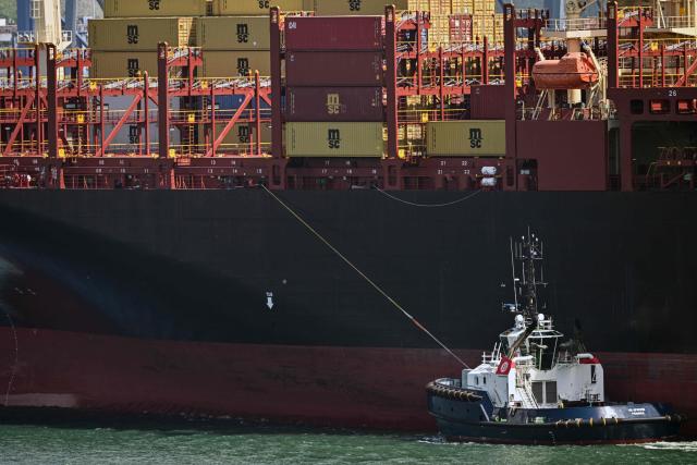 The vessel MSC Elisabetta sailing under the flag of Liberia arrives at the port of Balboa in Panama City on February 12, 2026. Hong Kong-based conglomerate CK Hutchison warned on February 12 of possible legal action against Danish firm Maersk and others over the annulment of its contract to operate two ports on the Panama Canal. (Photo by MARTIN BERNETTI / AFP)
