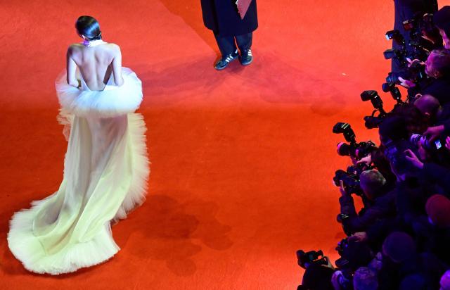German actress and model Gizem Emre poses for photographers as she arrives on the red carpet for the premiere of the film "No Good Men" presented in the Berlinale Special Gala section and opening the 76th Berlinale, Europe's first major film festival of the year, in Berlin on February 12, 2026. (Photo by John MACDOUGALL / AFP)