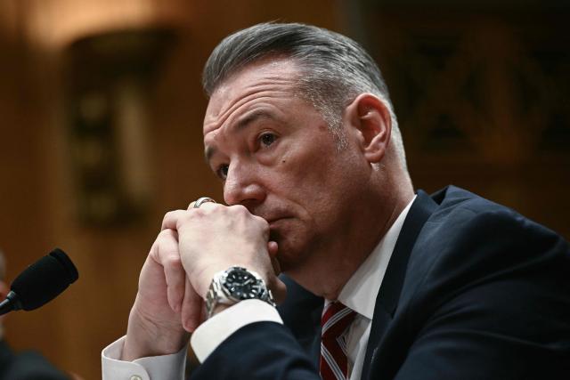 Acting Director of US Immigration and Customs Enforcement (ICE) Todd Lyons testifies before a Senate Homeland Security and Governmental Affairs Committee in an oversight hearing amid scrutiny over immigration enforcement and recent developments in Minnesota at the Dirksen Senate Office Building in Washington, DC on February 12, 2026. (Photo by Brendan SMIALOWSKI / AFP)