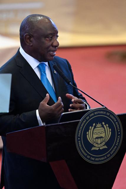 South African President Cyril Ramaphosa gestures as he delivers the State of the Nation (SONA) address in Cape Town on February 12, 2026. (Photo by Rodger Bosch / POOL / AFP)