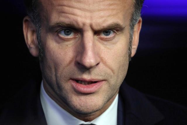 France's President Emmanuel Macron looks on as he addresses the media after attending the Informal EU Leaders' Retreat at the Alden Biesen Castle, in Rijkhoven on February 12, 2026. (Photo by Ludovic MARIN / AFP)