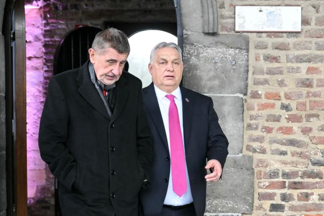 Czech Prime Minister Andrej Babis (L) and Hungary's Prime Minister Viktor Orban (R) arrive for a working session during the Informal EU Leaders' Retreat at the Alden Biesen Castle, in Rijkhoven on February 12, 2026. (Photo by NICOLAS TUCAT / AFP)
