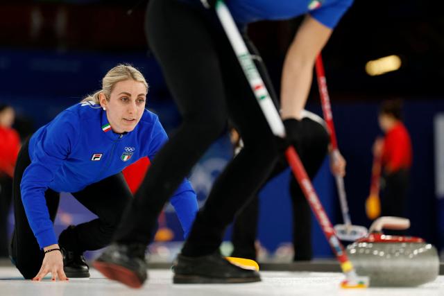 Italy's Elena Mathis watches the stone during the curling women's round robin between Italy and South Korea during the Milano Cortina 2026 Winter Olympic Games at the Cortina Curling Olympic Stadium in Cortina d’Ampezzo on February 12, 2026. (Photo by Odd ANDERSEN / AFP)