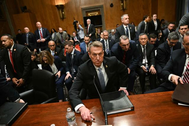 US Customs and Border Protection (CBP) Commissioner Rodney Scott gets ready to leave after the Senate Homeland Security and Governmental Affairs Committee in an oversight hearing amid scrutiny over immigration enforcement and recent developments in Minnesota at the Dirksen Senate Office Building in Washington, DC on February 12, 2026. (Photo by Brendan SMIALOWSKI / AFP)