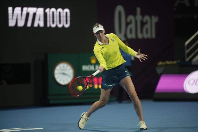 Kazakhstan's Elena Rybakina hits a return against Canada's Victoria Mboko during their women’s singles quarter-final match at the Qatar Open tennis tournament in Doha on February 12, 2026. (Photo by Karim JAAFAR / AFP)