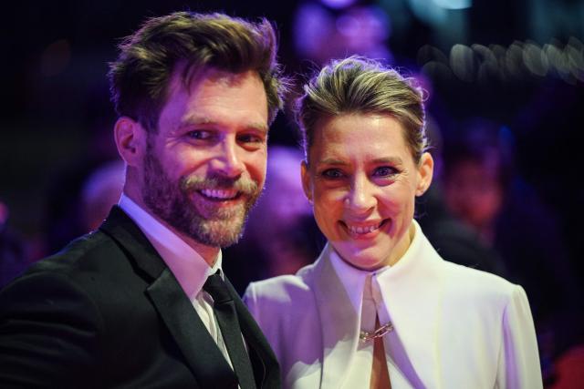 German actor Ken Duken and German actress Marisa Leonie Bach arrive on the red carpet for the premiere of the film "No Good Men" presented in the Berlinale Special Gala section and opening the 76th Berlinale, Europe's first major film festival of the year, in Berlin on February 12, 2026. (Photo by RALF HIRSCHBERGER / AFP)