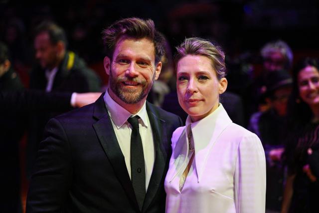 German actor Ken Duken and German actress Marisa Leonie Bach arrive on the red carpet for the premiere of the film "No Good Men" presented in the Berlinale Special Gala section and opening the 76th Berlinale, Europe's first major film festival of the year, in Berlin on February 12, 2026. (Photo by RALF HIRSCHBERGER / AFP)