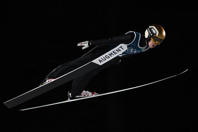 France's Valentin Foubert jumps during the men's ski jumping large hill training of the Milano Cortina 2026 Winter Olympic Games at Predazzo Ski Jumping Stadium in Predazzo (Val di Fiemme), on February 12, 2026. (Photo by Javier SORIANO / AFP)
