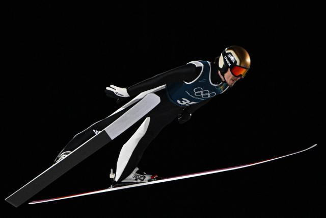 Norway's Johann Andre Forfang jumps during the men's ski jumping large hill training of the Milano Cortina 2026 Winter Olympic Games at Predazzo Ski Jumping Stadium in Predazzo (Val di Fiemme), on February 12, 2026. (Photo by Javier SORIANO / AFP)