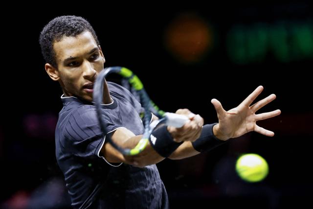 Canada's Felix Auger-Aliassime hits a return against Serbia's Hamad Medjedovic during their Rotterdam Open ATP tournament Round of 16 tennis match in Rotterdam on February 12, 2026. (Photo by ANP / AFP) / Netherlands OUT