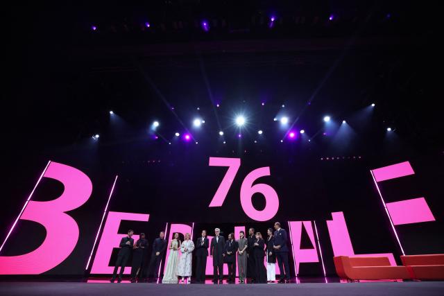 Jury President and German director Wim Wenders poses with other jury members during the opening ceremony of the 76th Berlinale, Europe's first major film festival of the year, in Berlin on February 12, 2026. (Photo by Ronny HARTMANN / AFP)