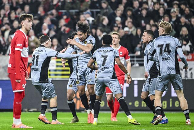 RSC Anderlecht's Canadian midfielder #13 Nathan-Dylan Saliba (3L) celebrates scoring his team's first goal during the second leg of the Belgium 'Croky Cup' semifinal football match between Royal Antwerp FC and RSC Anderlecht at Bosuilstadion stadium in Antwerp on February 12, 2026. (Photo by Tom Goyvaerts / Belga / AFP) / Belgium OUT