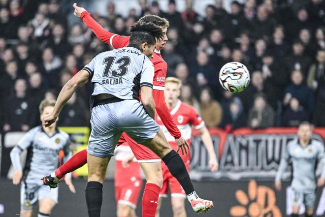 RSC Anderlecht's Canadian midfielder #13 Nathan-Dylan Saliba heads the ball to score his team's first goal during the second leg of the Belgium 'Croky Cup' semifinal football match between Royal Antwerp FC and RSC Anderlecht at Bosuilstadion stadium in Antwerp on February 12, 2026. (Photo by Tom Goyvaerts / Belga / AFP) / Belgium OUT