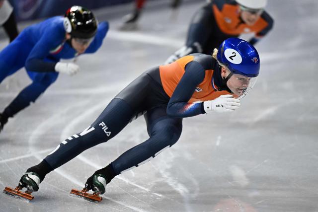Netherlands' Xandra Velzeboer, Italy's Arianna Fontana and Netherlands' Selma Poutsma compete in the short track speed skating women's 500m final during the Milano Cortina 2026 Winter Olympic Games at Milano Ice Skating Arena in Milan on February 12, 2026. (Photo by Gabriel BOUYS / AFP)