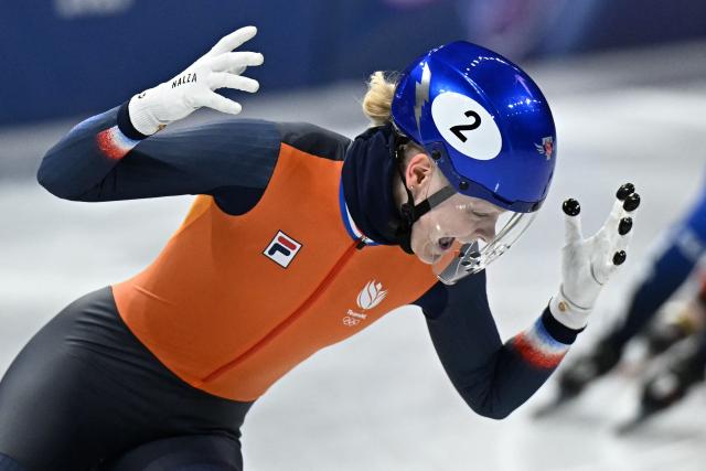 Netherlands' Xandra Velzeboer celebrates after winning gold in the short track speed skating women's 500m final during the Milano Cortina 2026 Winter Olympic Games at Milano Ice Skating Arena in Milan on February 12, 2026. (Photo by Gabriel BOUYS / AFP)