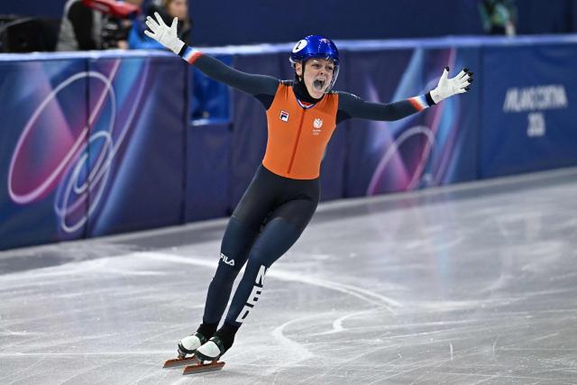 Netherlands' Xandra Velzeboer celebrates after winning gold in the short track speed skating women's 500m final during the Milano Cortina 2026 Winter Olympic Games at Milano Ice Skating Arena in Milan on February 12, 2026. (Photo by Gabriel BOUYS / AFP)