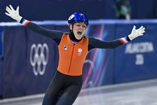 Netherlands' Xandra Velzeboer celebrates after winning gold in the short track speed skating women's 500m final during the Milano Cortina 2026 Winter Olympic Games at Milano Ice Skating Arena in Milan on February 12, 2026. (Photo by Gabriel BOUYS / AFP)
