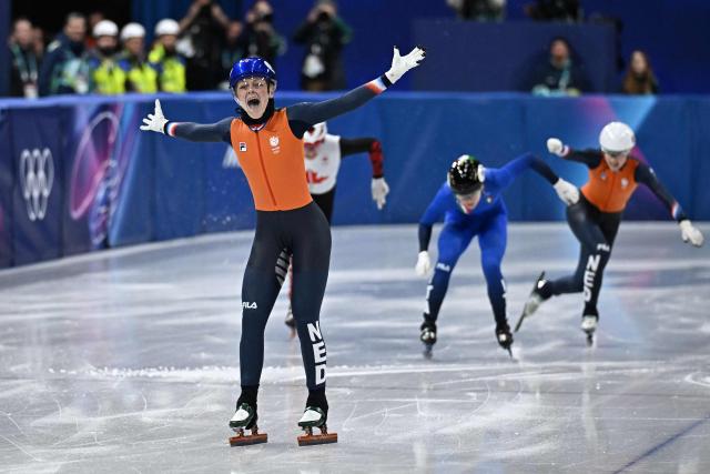 Netherlands' Xandra Velzeboer celebrates after winning gold in the short track speed skating women's 500m final during the Milano Cortina 2026 Winter Olympic Games at Milano Ice Skating Arena in Milan on February 12, 2026. (Photo by Gabriel BOUYS / AFP)