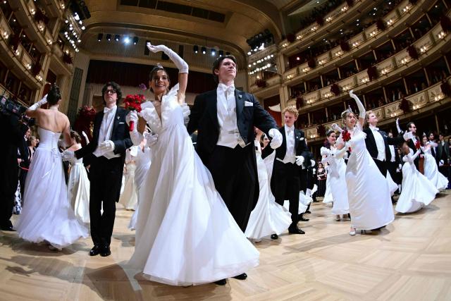 Young couples take part in the 68th edition of the Vienna Opera Ball at the State Opera in Vienna on February 12, 2026. (Photo by ROLAND SCHLAGER / APA / AFP) / Austria OUT