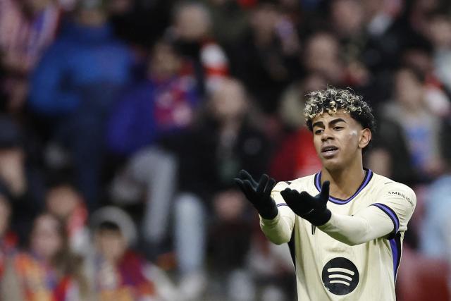 Barcelona's Spanish forward #10 Lamine Yamal reacts during the Spanish Copa del Rey (King's Cup) semi final first leg football match between Club Atletico de Madrid and FC Barcelona at Metropolitano Stadium in Madrid on February 12, 2026. (Photo by Oscar DEL POZO / AFP)