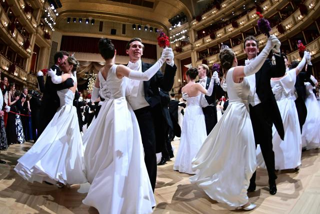 Young couples take part in the 68th edition of the Vienna Opera Ball at the State Opera in Vienna on February 12, 2026. (Photo by ROLAND SCHLAGER / APA / AFP) / Austria OUT