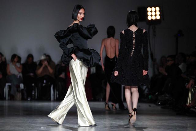 Models walk the runway during the Christian Siriano Fall/Winter 2026 fashion show in New York, on February 12, 2026. (Photo by CHARLY TRIBALLEAU / AFP)