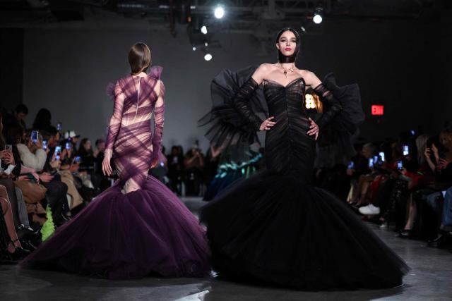 Models walk the runway during the Christian Siriano Fall/Winter 2026 fashion show in New York, on February 12, 2026. (Photo by CHARLY TRIBALLEAU / AFP)