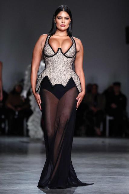 A model walks the runway during the Christian Siriano Fall/Winter 2026 fashion show in New York, on February 12, 2026. (Photo by CHARLY TRIBALLEAU / AFP)