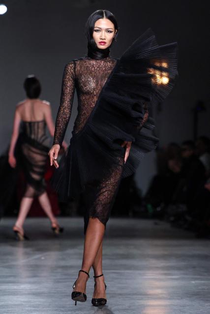 A model walks the runway during the Christian Siriano Fall/Winter 2026 fashion show in New York, on February 12, 2026. (Photo by CHARLY TRIBALLEAU / AFP)