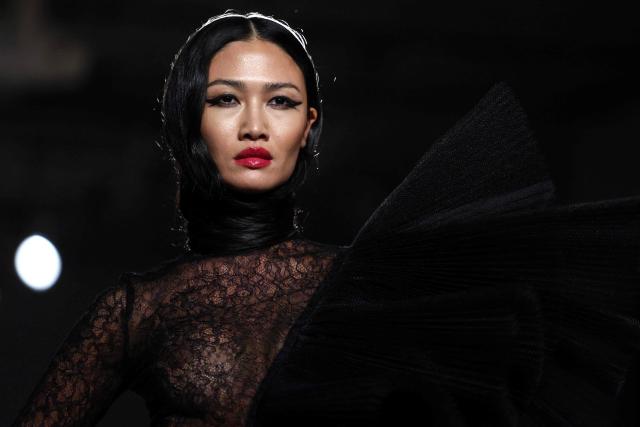 A model walks the runway during the Christian Siriano Fall/Winter 2026 fashion show in New York, on February 12, 2026. (Photo by CHARLY TRIBALLEAU / AFP)