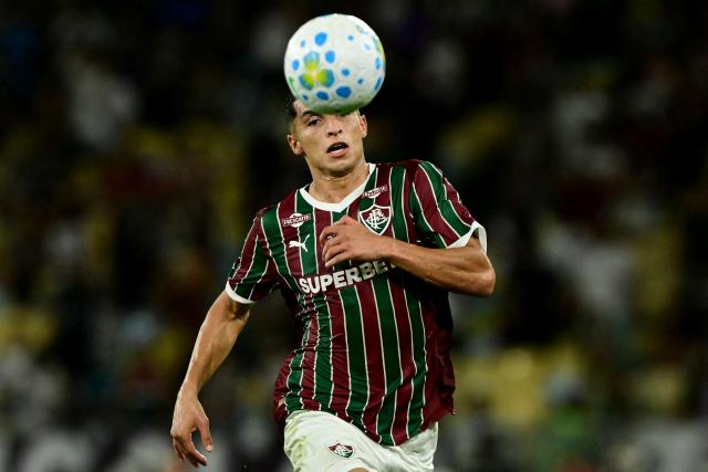 Botafogo's forward #90 Matheus Nascimento eyes the ball during the Campeonato Brasileiro Serie A football match between Fluminense and Botafogo at the Maracana Stadium in Rio de Janeiro, Brazil, on February 12, 2026. (Photo by Pablo PORCIUNCULA / AFP)