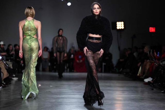 Models walk the runway during the Christian Siriano Fall/Winter 2026 fashion show in New York, on February 12, 2026. (Photo by CHARLY TRIBALLEAU / AFP)