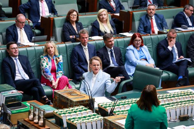 Australia’s opposition Liberal Party leader Sussan Ley (C), the party's first female leader, gestures during Question Time at Federal Parliament in Canberra on February 11, 2026. Australia's centre-right opposition Liberal Party on February 13 elected as leader a conservative who lobbied to drop its commitment to net zero emissions, local media reported. Angus Taylor -- a former energy minister -- replaces Sussan Ley, the party's first female leader who had been in office for less than a year. (Photo by DAVID GRAY / AFP)
