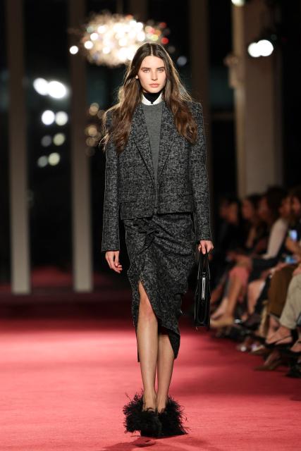 A model walks the runway during the Michael Kors Fall/Winter 2026 fashion show marking the designer's 45th anniversary in fashion in New York on February 12, 2026. (Photo by ANGELA WEISS / AFP)