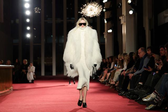A model walks the runway during the Michael Kors Fall/Winter 2026 fashion show marking the designer's 45th anniversary in fashion in New York on February 12, 2026. (Photo by ANGELA WEISS / AFP)