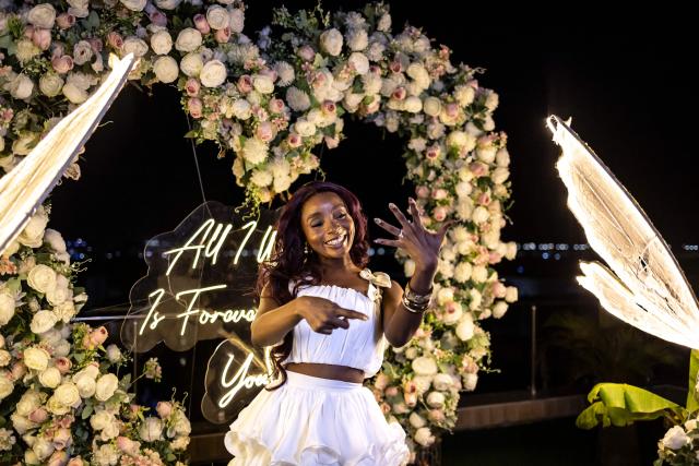 Fehintola Da-Silva poses for a photograph with her engagement ring after a surprise marriage proposal on the rooftop of a private residence in Lagos on February 7, 2026. (Photo by OLYMPIA DE MAISMONT / AFP)
