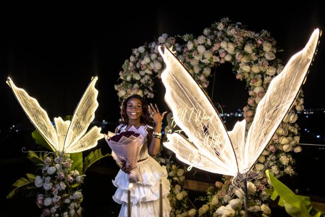 Fehintola Da-Silva poses for a photograph with her engagement ring after a surprise marriage proposal on the rooftop of a private residence in Lagos on February 7, 2026. (Photo by OLYMPIA DE MAISMONT / AFP)