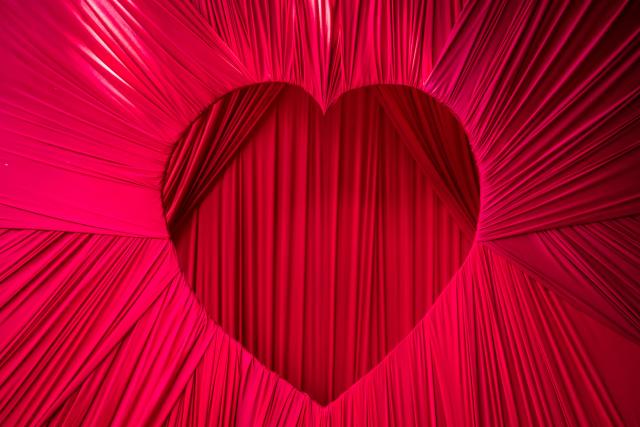 A general view of a heart-shaped photo box at The Locale restaurant in Lagos, on February 11, 2026. The five-months old matchmaking site, which is one of several online matchmaking platforms that have sprung up in the city, has attracted 1,000 clients and garnered around 10,000 following across social media platforms, according to Jaafar Isah Shanawa, its 27-year old CEO. 
With four staff, the matchmaking platform accords privacy to its clients by modifying their pictures using AI-generated tools and changing their real names and addresses.
The concealed details are only shown to  interested clients when they visit the office in person after paying the required registration fees. (Photo by OLYMPIA DE MAISMONT / AFP)