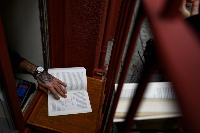 View of the entrance of The Museum of Innocence in Istanbul on February 10, 2026. On a cobbled street in Cukurcuma, a district known for its antiques shops on Istanbul's European side, the story penned by Nobel Literature Prize-winning Turkish author Orhan Pamuk has been brought to life inside the walls of a red-painted house. (Photo by Yasin AKGUL / AFP)