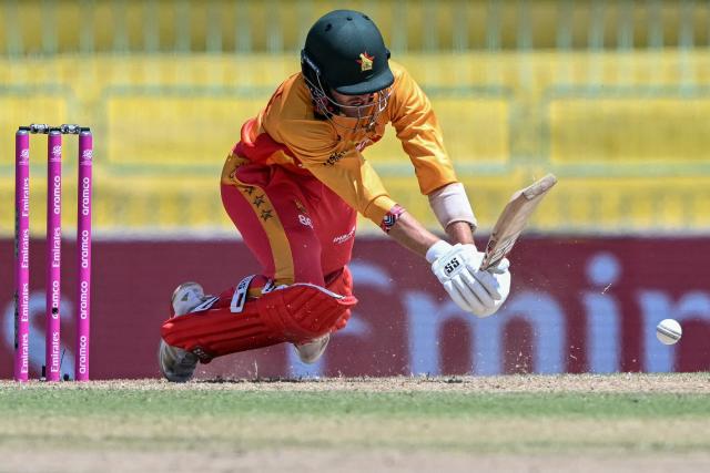 Zimbabwe's Brian Bennett plays a shot during the 2026 ICC Men's T20 Cricket World Cup group stage match between Australia and Zimbabwe at the R Premadasa Stadium in Colombo on February 13, 2026. (Photo by Ishara S. KODIKARA / AFP)