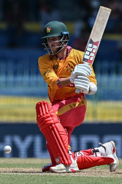 Zimbabwe's Brian Bennett plays a shot during the 2026 ICC Men's T20 Cricket World Cup group stage match between Australia and Zimbabwe at the R Premadasa Stadium in Colombo on February 13, 2026. (Photo by Ishara S. KODIKARA / AFP)